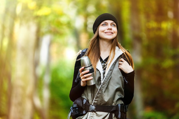 Tourist Girl in the Forest