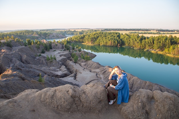 Tourist girl in konduki quarries landscapes