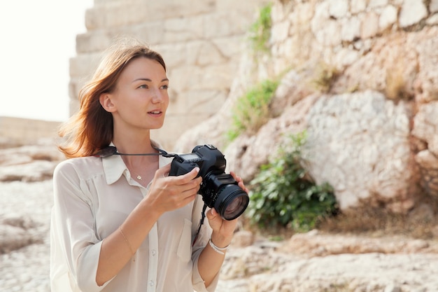 The tourist near the Acropolis of Athens Greece