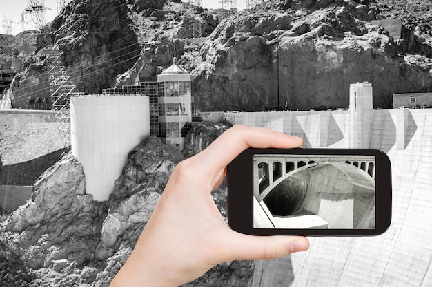 Photo tourist shooting photo of hoover dam