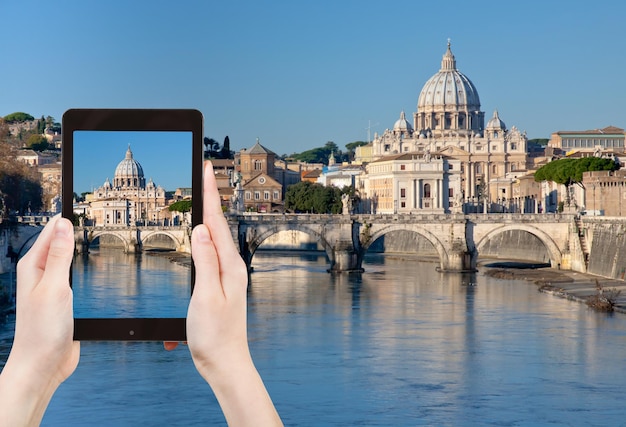 Tourist taking photo of Rome cityscape