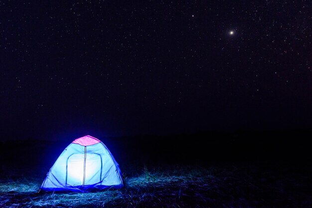 Tourist tent at night Night sky with the many stars