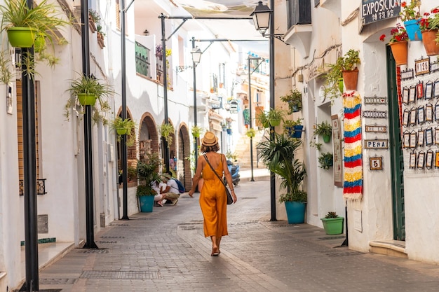 A tourist in the white houses walking in the municipality of Mijas in Malaga Andalusia