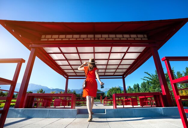 Tourist with camera in Japanese pagoda