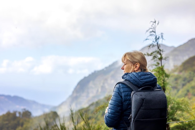 Tourist woman enjoing landscape of Madeira