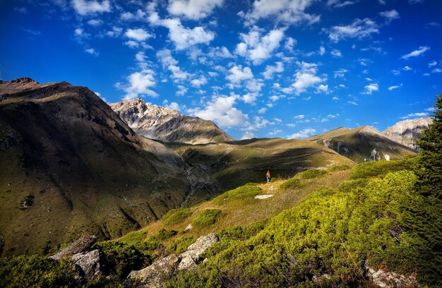 Tourist woman in the mountains