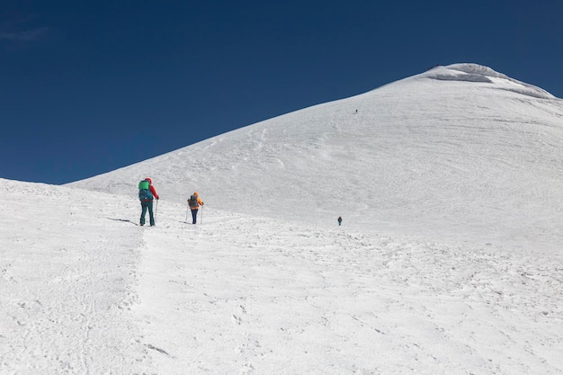 Tourists climb the glacier to the top of Mount Greater Ararat Agri Dagi Eastern Anatolia Region Turkey