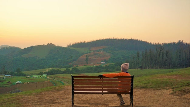 Tourists enjoying the Beautiful view of Wenlock Downs 9th Mile Shooting Point Ooty during sunset Must visit place in evening by tourists