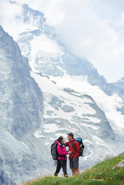 Tourists enjoying mountains scenery together