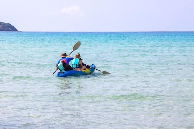 Tourists kayaking sea beautiful area ao bang bao at Koh Kood island Trat, Thailand.