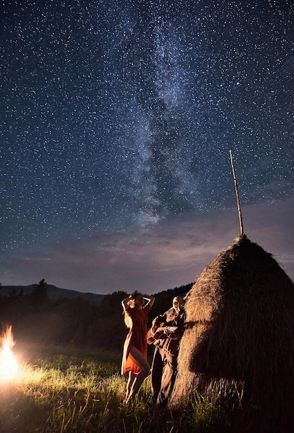 Tourists in the mountains by night