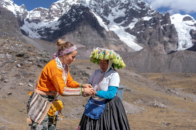 Tourists on their way to the Ausangate mountain in the city of Cusco