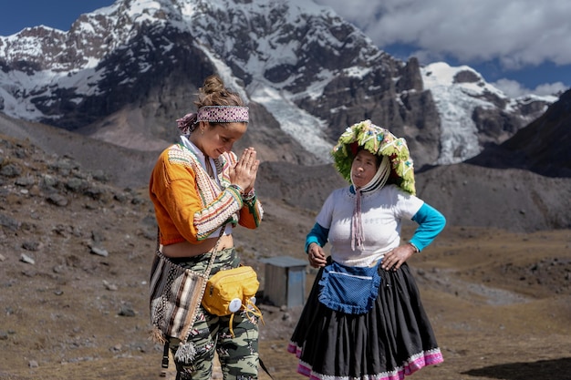 Tourists on their way to the Ausangate mountain in the city of Cusco