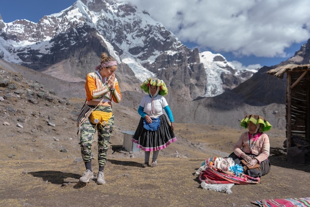 Tourists on their way to the Ausangate mountain in the city of Cusco