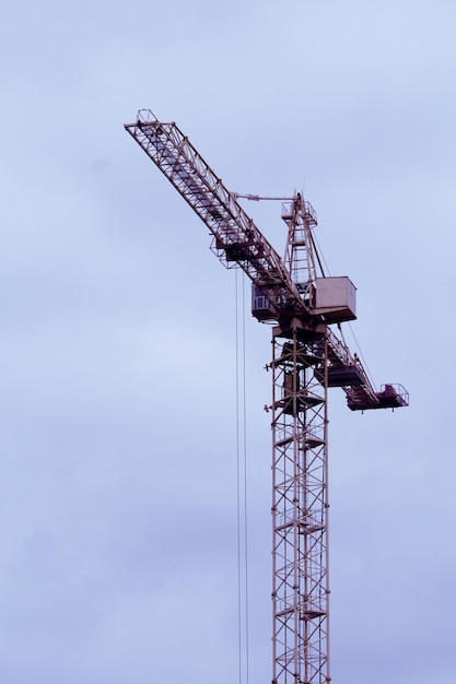 Tower Crane Works Over Concrete Frame Of New Building