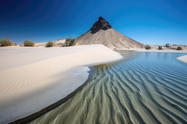 A towering sand dune surrounded by a mirage of crystalclear water