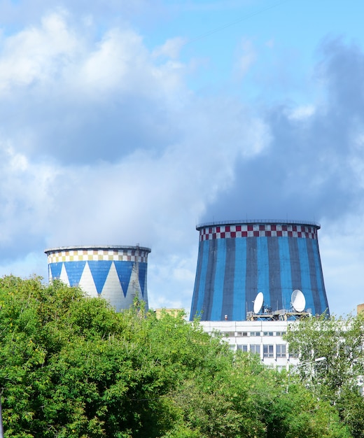 Towers of CHP in the city. Central Heating and Power Plant.