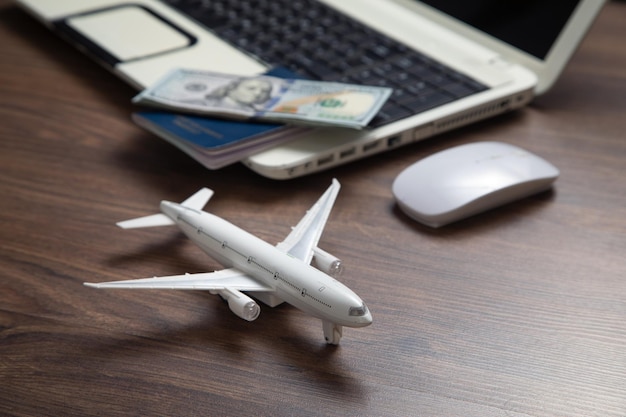 Toy airplane with a laptop computer