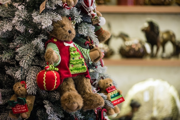 Photo toy bear on the christmas tree