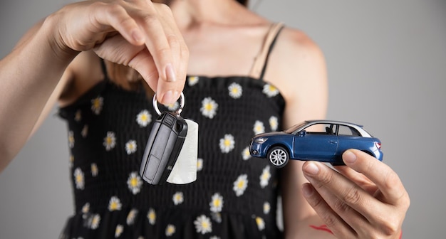 Toy car on a female palm