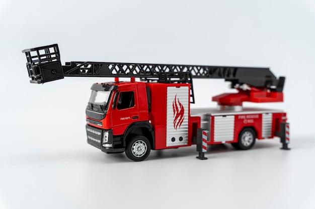 Toy fire truck on a white background Emergency vehicle