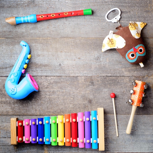 Toy Musical instruments on wooden background