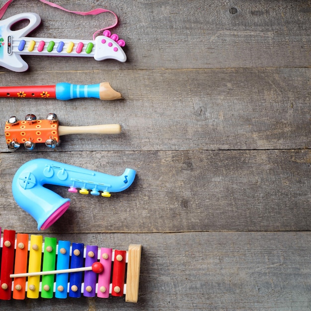 Toy Musical instruments on wooden background