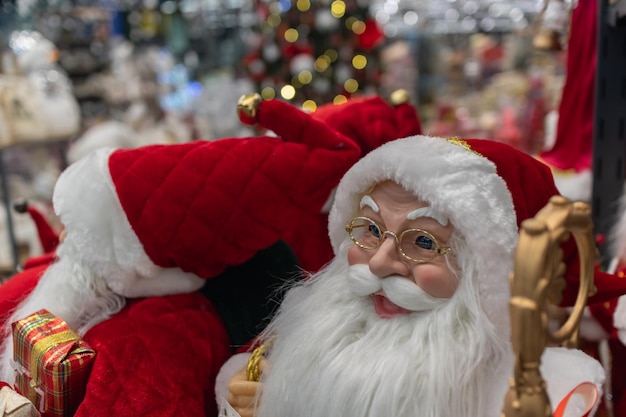 Toy Santa Clauses in the supermarket Christmas decor in the supermarket Christmas decorations