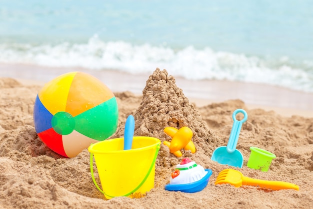 Toys for childrens sandboxes against the sea and the beach