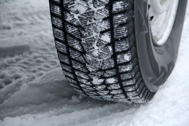 Traces of tread blocks of winter tires under off road vehicle