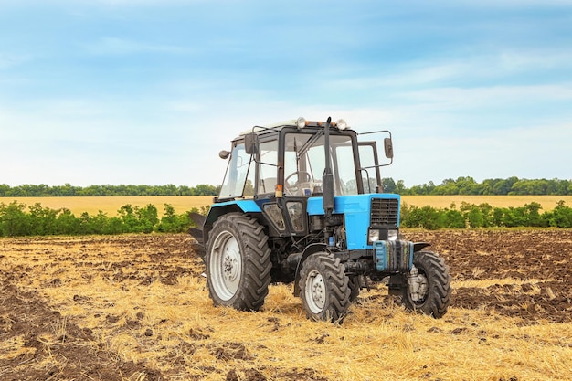 Tractor in field after harvest