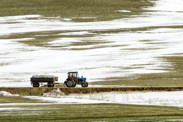 Tractor on snowy field