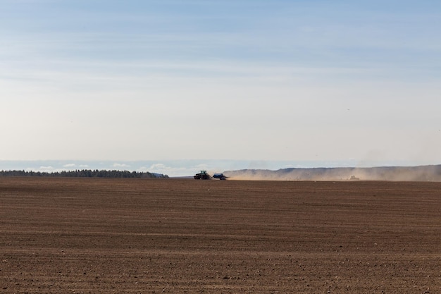 A tractor with a large double plow