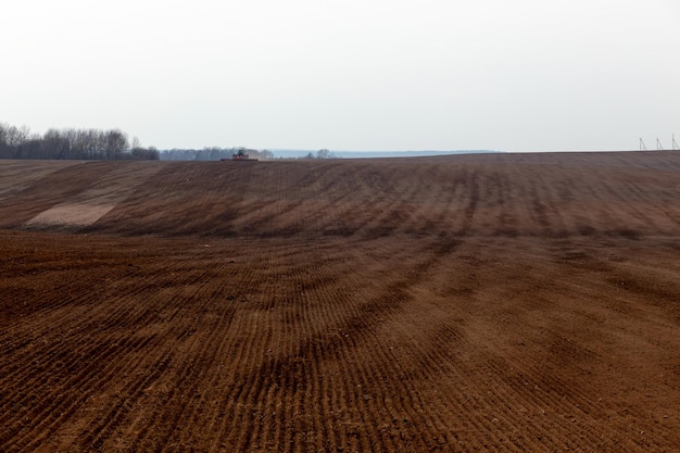 A tractor with a large double plow