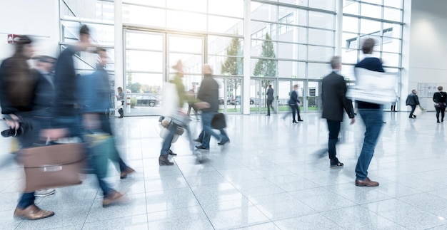 Trade fair visitors at a modern hall