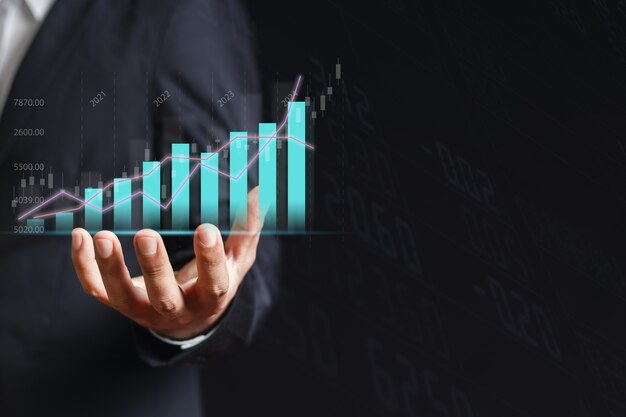 Trading graph appear from the hand of businessman, Stock exchange marketing analyzing chart. information statistics diagram profit. investment and marketing concept.