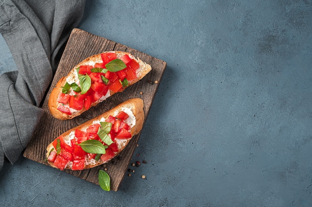 Traditional  appetizer bruschetta with tomatoes