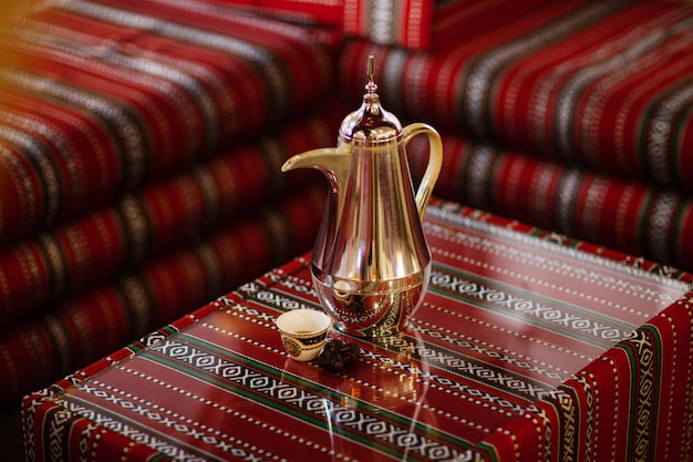 Traditional Arabic tea set and dried dates