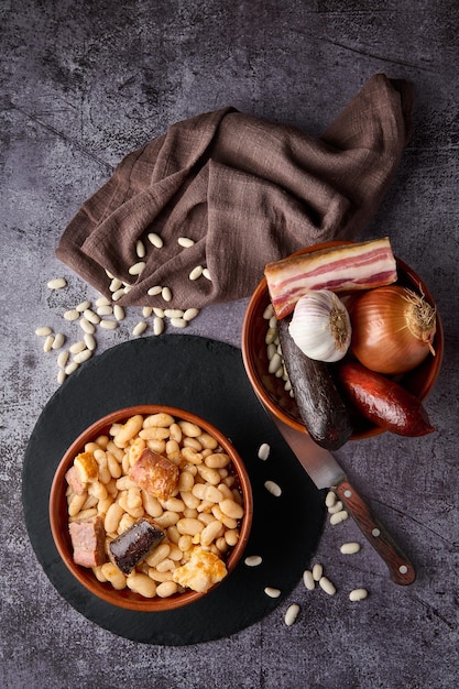 Traditional Asturian bean stew and its ingredients