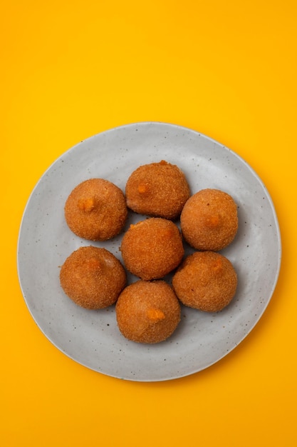 Traditional brasilian fried drumsticks Coxinha de frango on dish