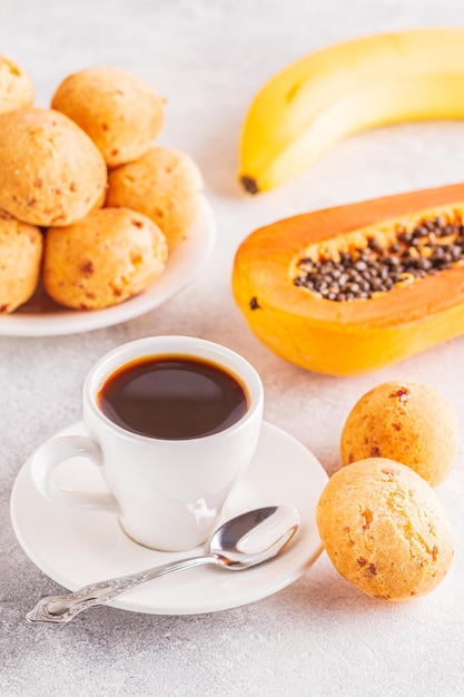 Traditional Brazilian breakfast cheese bread coffee ripe fruit