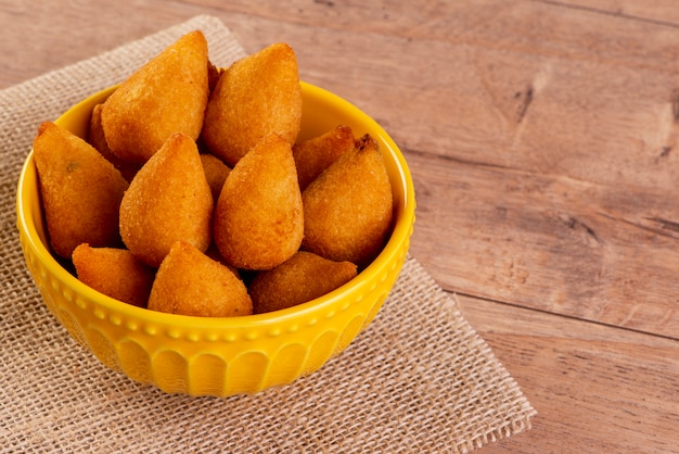 Traditional Brazilian fried snack made with chicken known as "coxinha"