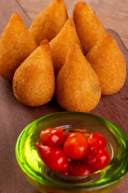 Traditional Brazilian fried snack made with chicken known as coxinha