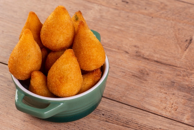 Traditional Brazilian fried snack stuffed with chicken.