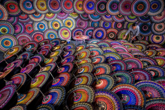 Traditional Burmese umbrellas. Colorful umbrellas at traditional street market in Bagan, Myanmar (Burma).Colored Burmese Umbrellas.Beautiful multi-colored umbrellas from Burma.