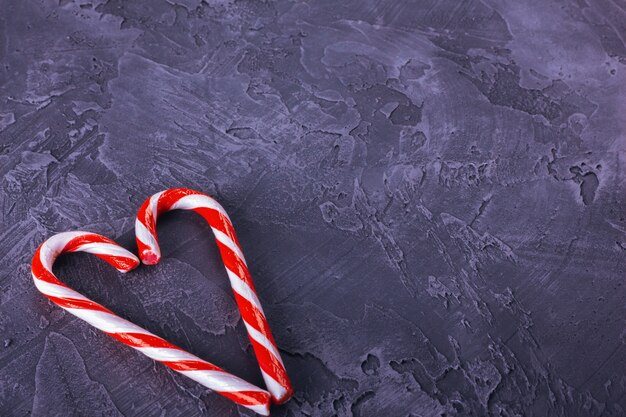 Traditional Christmas candy on a concrete background