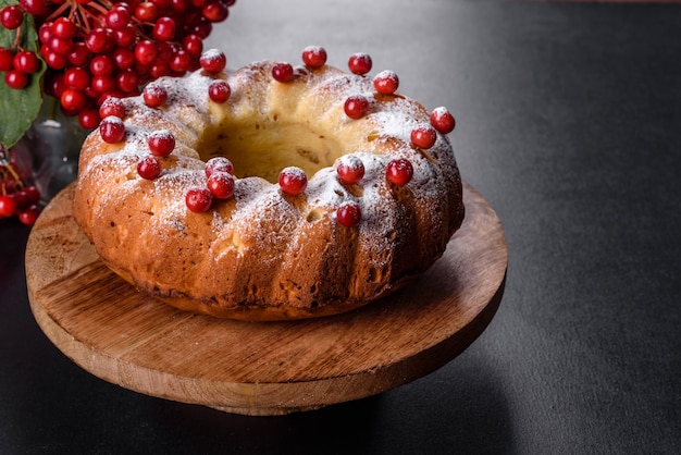 Traditional Christmas cranberry pie. Preparation of the festive table for the celebration of Christmas