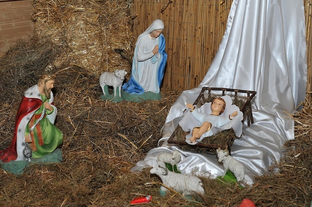 Traditional Christmas nativity scene with Mary and Joseph and baby Jesus in the manger.