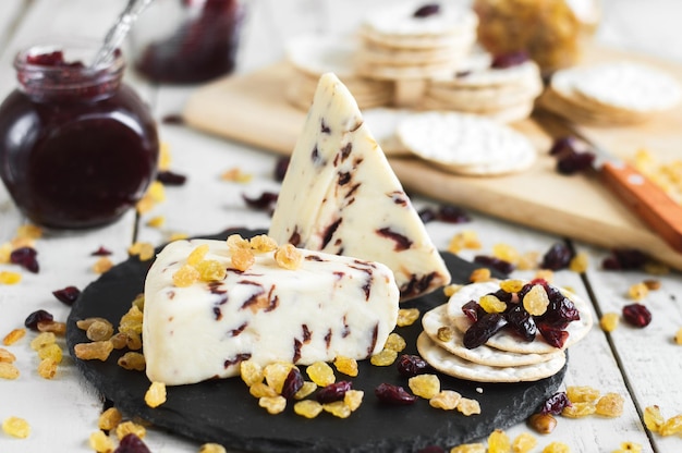 Traditional cranberry cheese with crackers served with jam