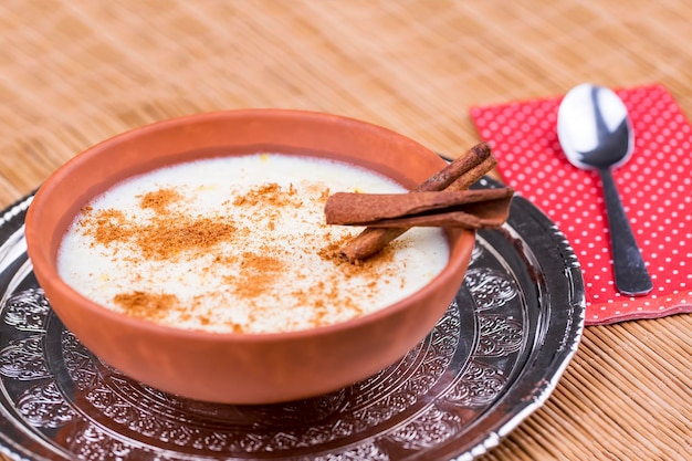 Traditional delicious Turkish desserts; rice pudding with milk (Sutlac)